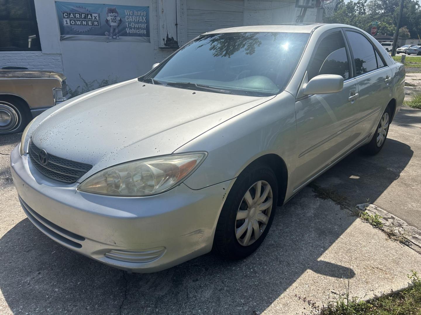 2002 Toyota Camry LE (4T1BE32K52U) with an 2.4L L4 DOHC 16V engine, located at 1758 Cassat Ave., Jacksonville, FL, 32210, (904) 384-2799, 30.286720, -81.730652 - CASH SPECIAL!!!! 2002 TOYOTA CAMRY LE MODEL 220,483 MILES $2500.00 CASH PLUS TAX, TAG, AND TITLE 4-DOOR AUTOMATIC TRANSMISSION ICE-COLD AIR-CONDITIONING SUNROOF 2.4L FOUR CYLINDER ENGINE CALL NOW @ 904-384-2799 BEFORE IT'S GONE - Photo#1