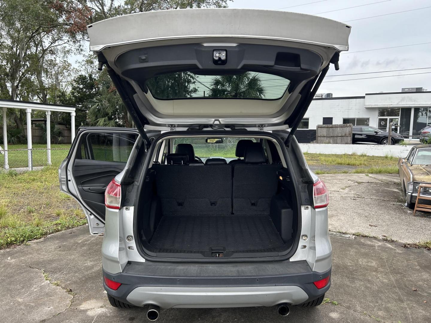 2013 Ford Escape Titanium FWD (1FMCU0J93DU) with an 2.0L L4 DOHC 16V engine, 6-Speed Automatic transmission, located at 1758 Cassat Ave., Jacksonville, FL, 32210, (904) 384-2799, 30.286720, -81.730652 - *****CASH DEAL!!!!!*****2013 FORD ESCAPE TITANIUM EDITION $3799.00 PLUS TAX, TAG, AND TITLE 4-DOOR LEATHER SUNROOF ICE-COLD AIR-CONDITIONING ALLOYS RUNS GREAT CALL US TODAY @ 904-384-2799 - Photo#17