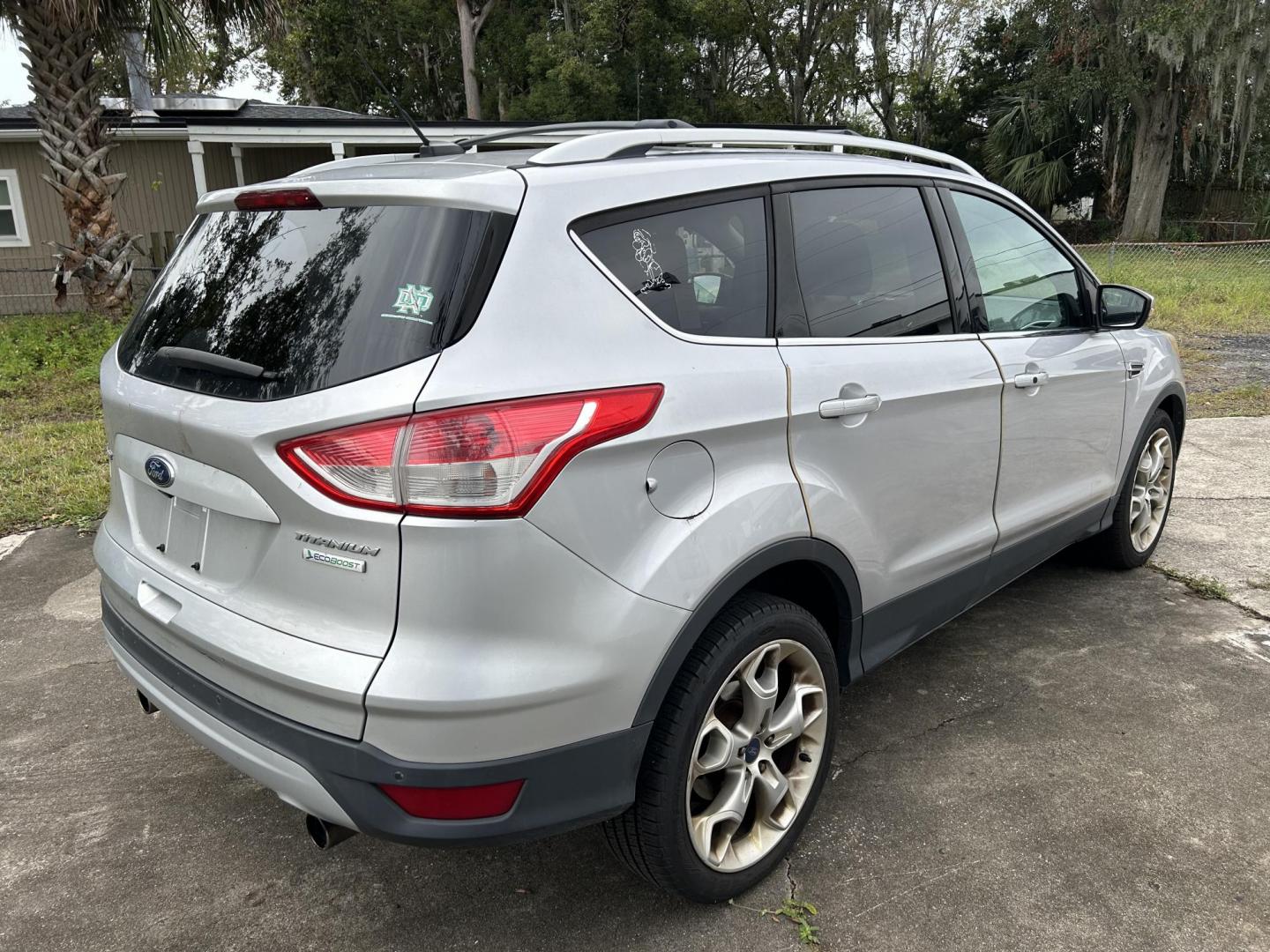 2013 Ford Escape Titanium FWD (1FMCU0J93DU) with an 2.0L L4 DOHC 16V engine, 6-Speed Automatic transmission, located at 1758 Cassat Ave., Jacksonville, FL, 32210, (904) 384-2799, 30.286720, -81.730652 - *****CASH DEAL!!!!!*****2013 FORD ESCAPE TITANIUM EDITION $3799.00 PLUS TAX, TAG, AND TITLE 4-DOOR LEATHER SUNROOF ICE-COLD AIR-CONDITIONING ALLOYS RUNS GREAT CALL US TODAY @ 904-384-2799 - Photo#5