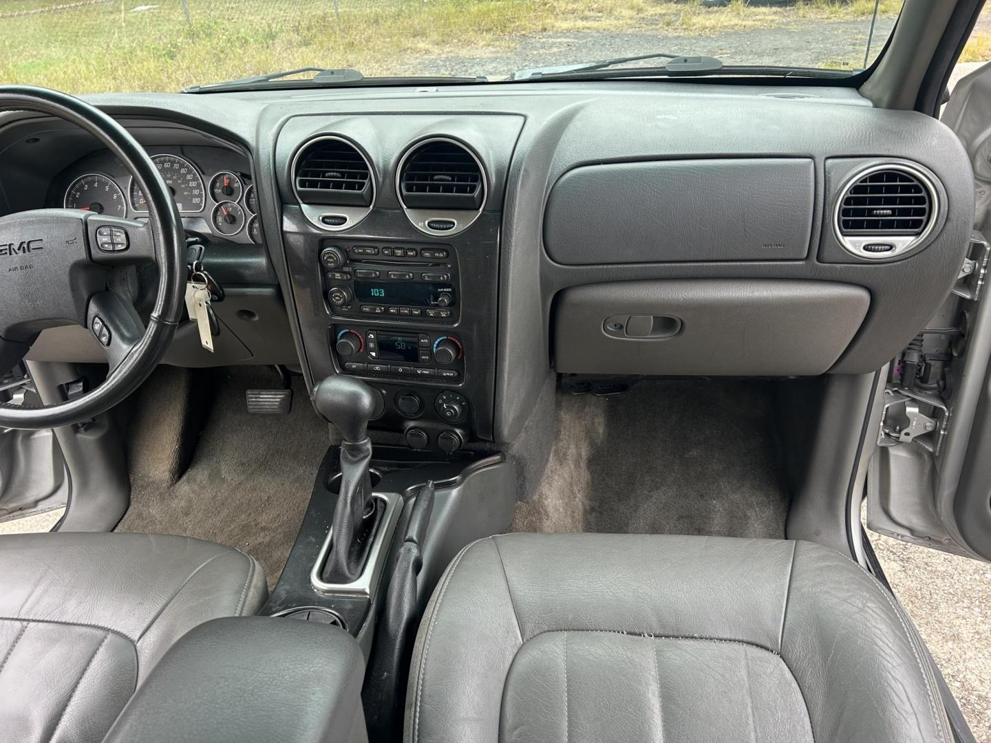 2004 GMC Envoy XUV SLE 4WD (1GKET12S246) with an 4.2L L6 DOHC 24V engine, 4-Speed Automatic Overdrive transmission, located at 1758 Cassat Ave., Jacksonville, FL, 32210, (904) 384-2799, 30.286720, -81.730652 - ***** $3099.00 PLUS TAX, TAG, AND TITLE*****CASH SPECIAL***** 2004 GMC ENVOY XUV 4X4 SLT MODEL 221,364 MILES VERY WELL TAKEN CARE OF RUNS AND LOOKS GREAT LEATHER SUNROOF HAS UNIQUE BARNDOOR TAILGATE WITH POWER GLASS RUNNING BOARDS ALLOYS THIS ONE'S GOT IT ALL!!!! CALL TODAY @ 904-384-2799 BEFORE IT' - Photo#13