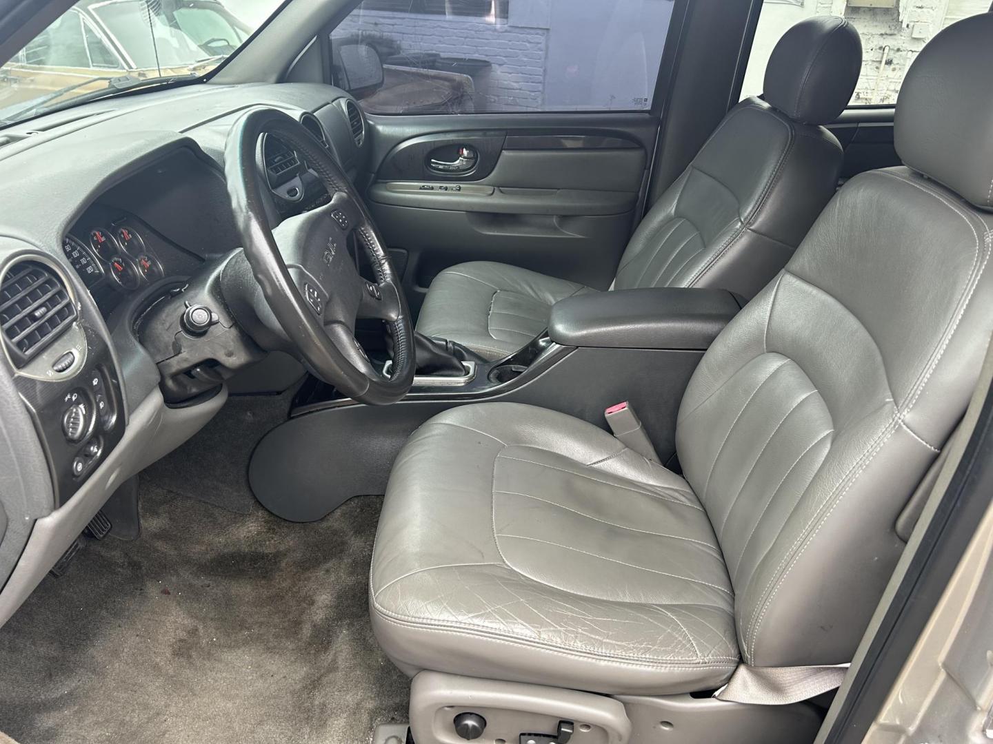 2004 GMC Envoy XUV SLE 4WD (1GKET12S246) with an 4.2L L6 DOHC 24V engine, 4-Speed Automatic Overdrive transmission, located at 1758 Cassat Ave., Jacksonville, FL, 32210, (904) 384-2799, 30.286720, -81.730652 - ***** $3099.00 PLUS TAX, TAG, AND TITLE*****CASH SPECIAL***** 2004 GMC ENVOY XUV 4X4 SLT MODEL 221,364 MILES VERY WELL TAKEN CARE OF RUNS AND LOOKS GREAT LEATHER SUNROOF HAS UNIQUE BARNDOOR TAILGATE WITH POWER GLASS RUNNING BOARDS ALLOYS THIS ONE'S GOT IT ALL!!!! CALL TODAY @ 904-384-2799 BEFORE IT' - Photo#6